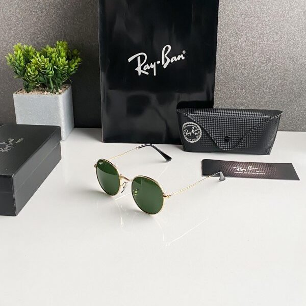 Rayban gold green 3447